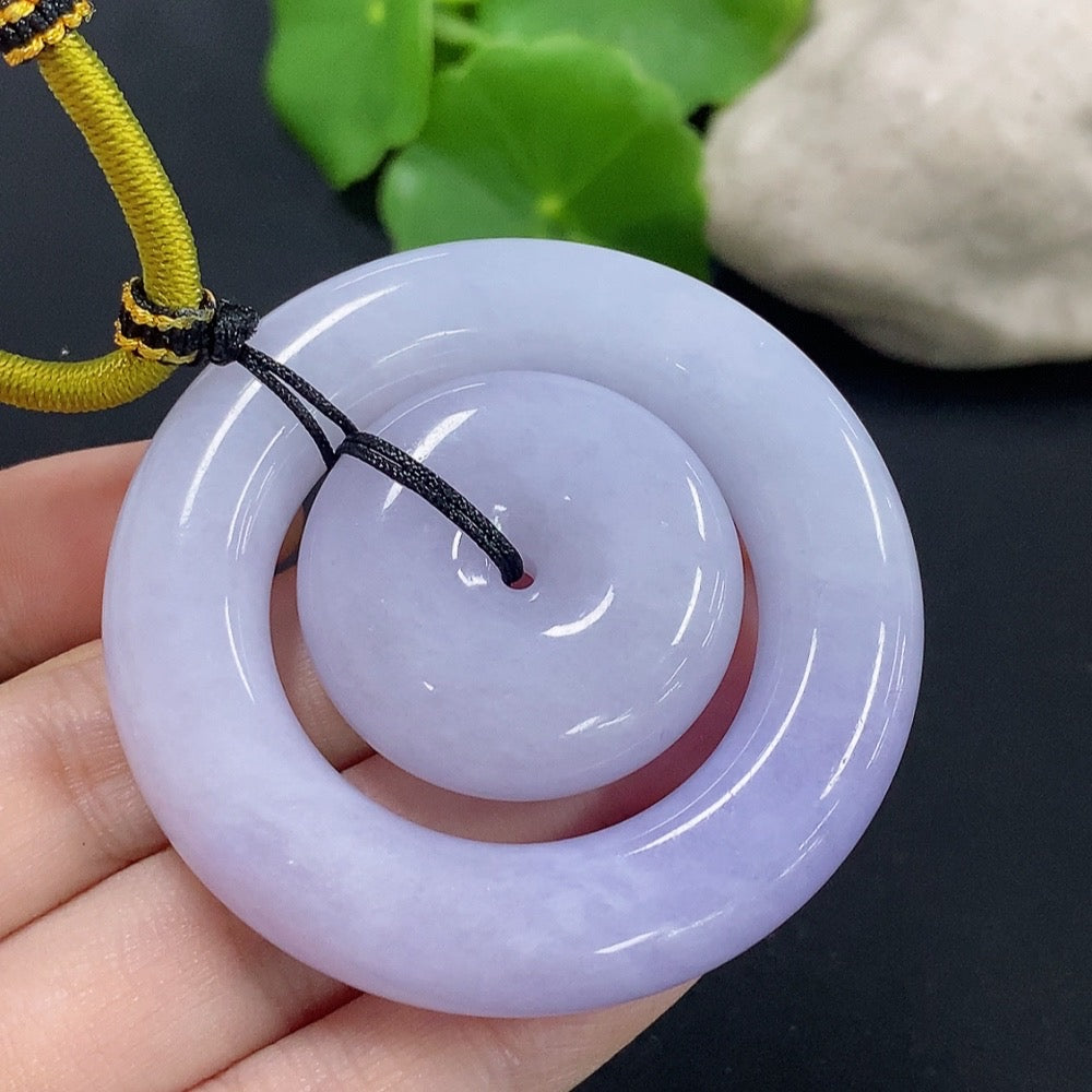 Jadeite mother-and-child toggle pendant by HKHQ, featuring a detailed jadeite design, weighing approximately 55.29g.