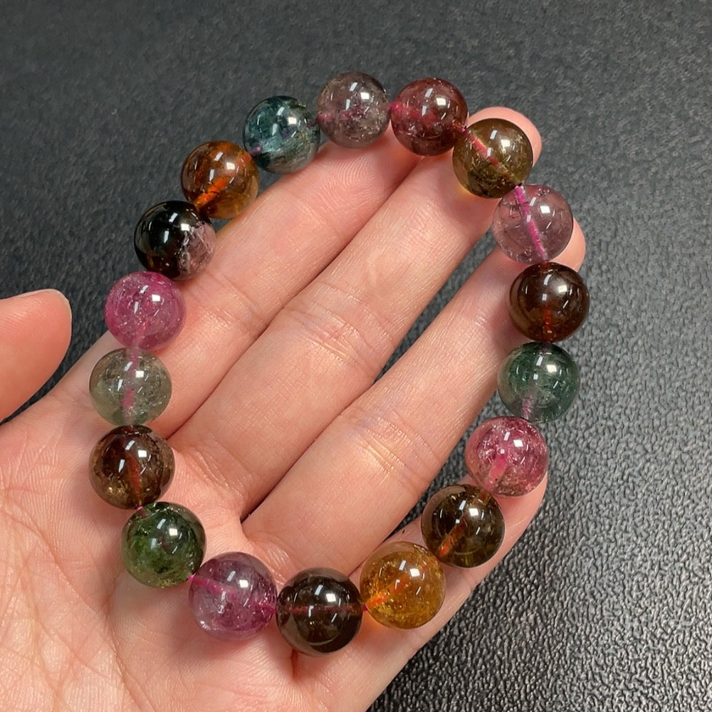 Huiliu certified tourmaline gemstone bracelet with visible organic matter, approximately 11.7mm size, natural and unique jewelry piece