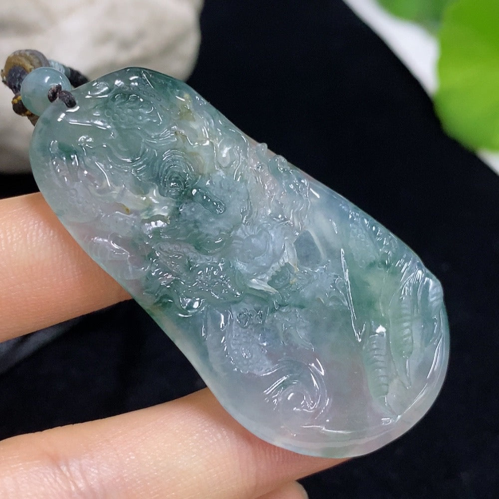 Jadeite dragon pendant with intricate carved design, weighing approximately 21.38g including rope, from HKHQ.