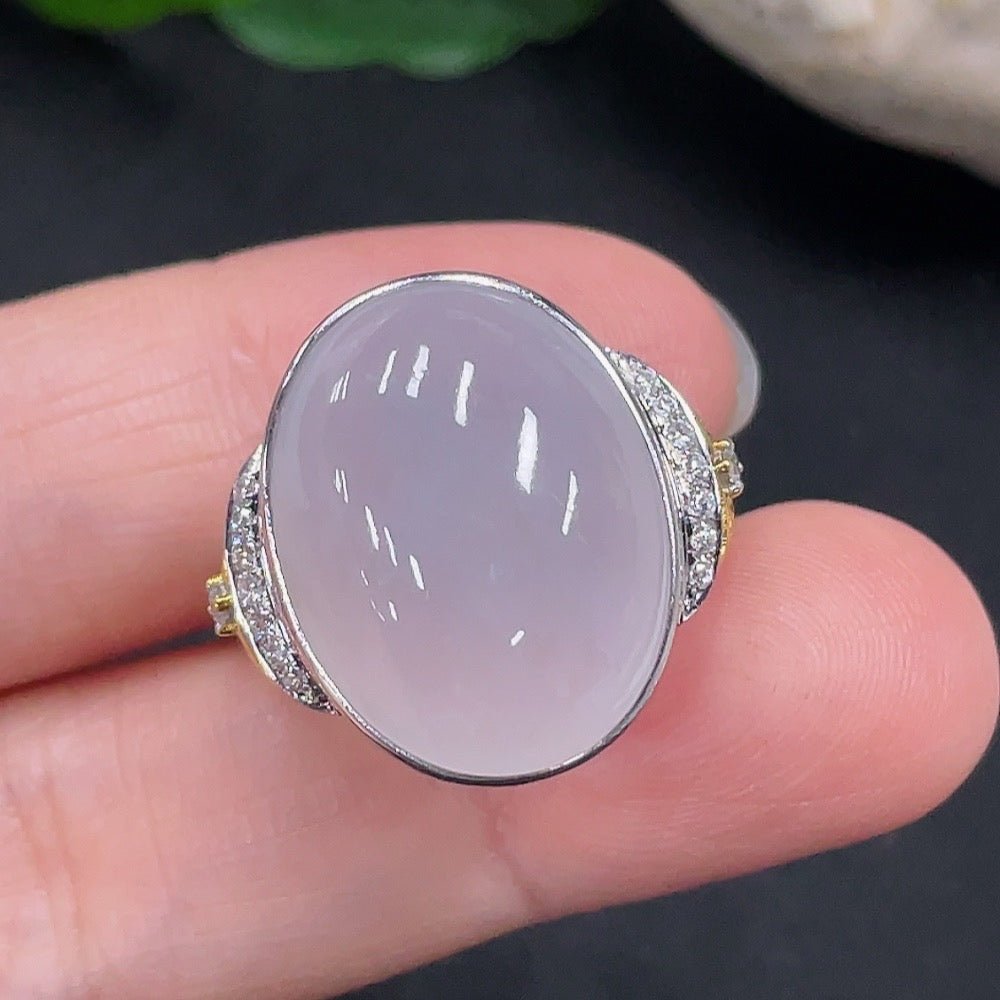 Huiliu jadeite ring with diamond accents, showcasing a smooth green jade stone and sparkling diamond details.
