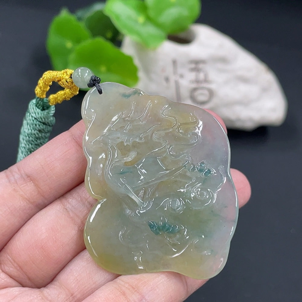 Huiliu Jadeite pendant featuring a polished jade piece with carved design, hangs on a delicate cord, showcasing elegant craftsmanship.