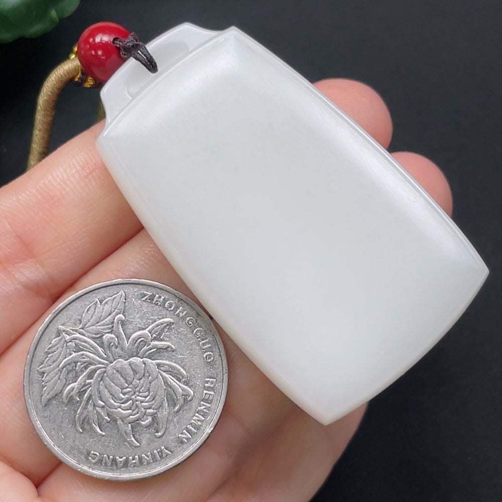 HKHQ Hetian Jade plain pendant with rope necklace, showcasing smooth green jade stone and elegant design, 39.3g weight.