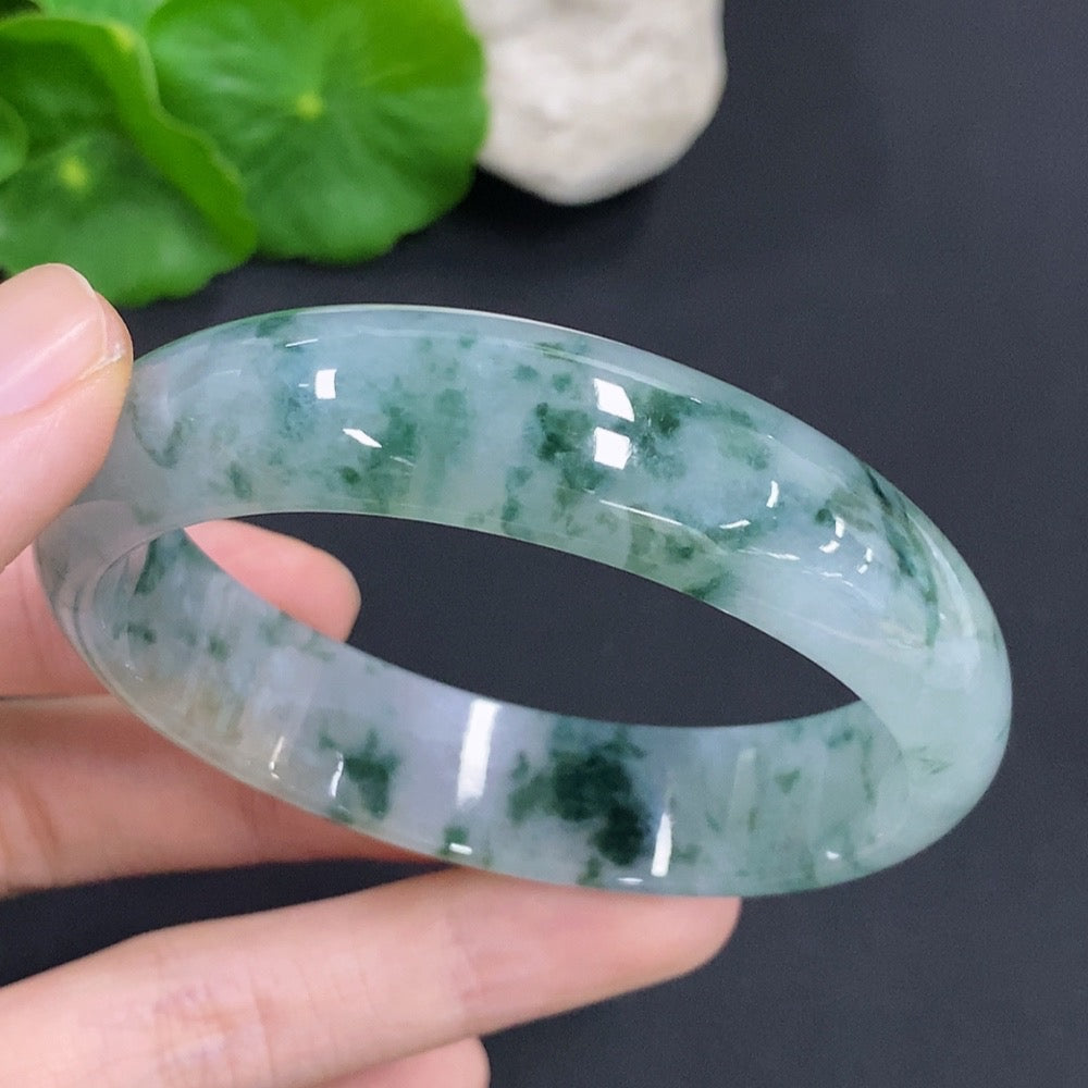 HKHQ jadeite oval bangle in size 58.8 with a 47.7g weight, showcasing smooth, polished jadeite bracelet detail.