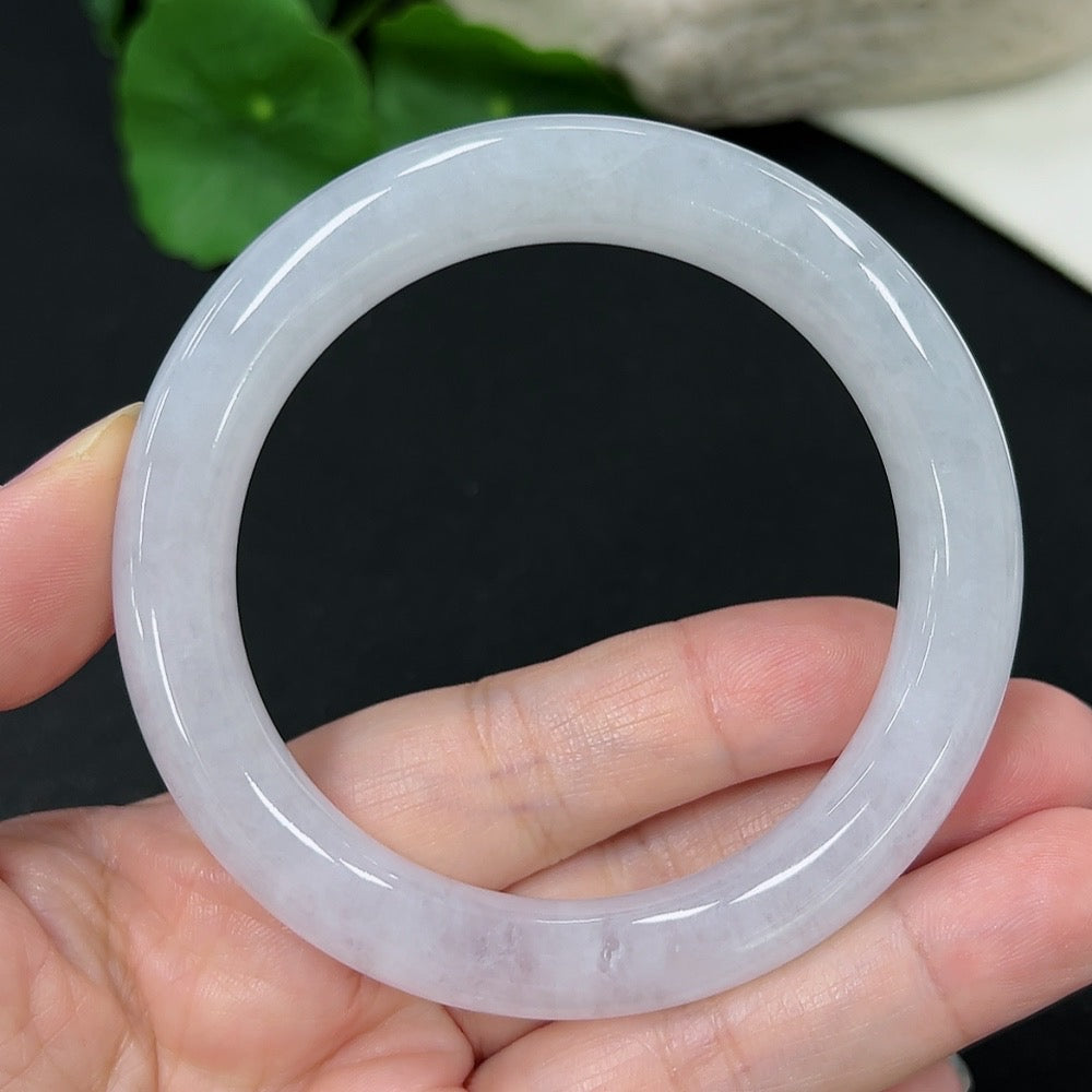 HKHQ jadeite round bangle size 55 with a total weight of 53.33g, showcasing smooth, polished green jadeite material.