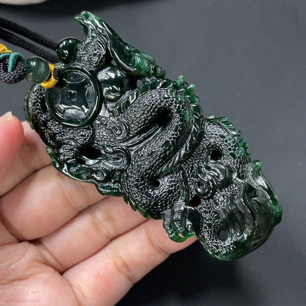 Huiliu Jadeite dragon pendant featuring intricate carved details, green jade stone, and a polished finish.