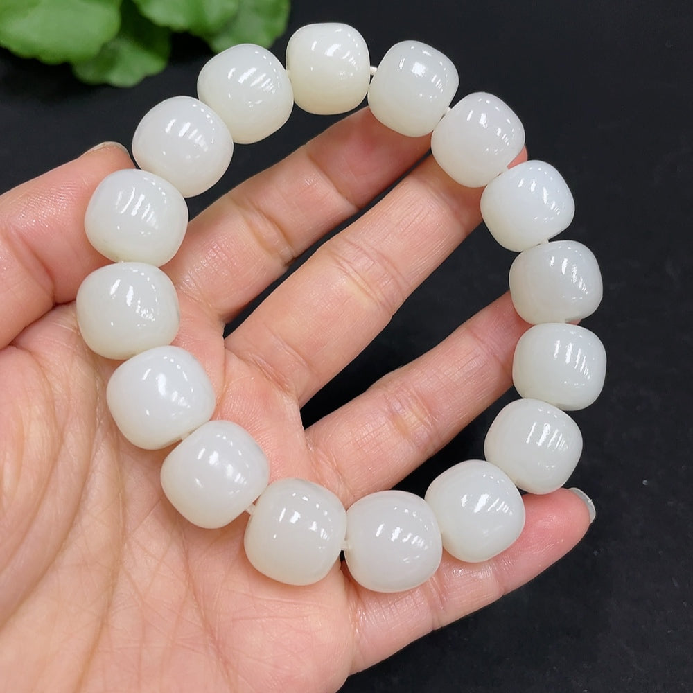 Huiliu certified Hetian Jade bracelet with 13.8mm smooth round beads, showcasing rich green and natural jade variations.
