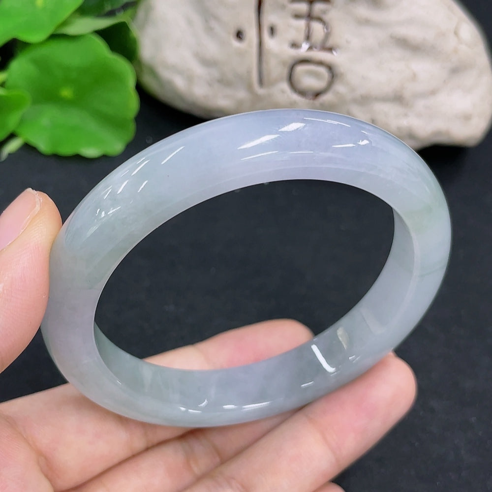 HKHQ jadeite round bangle in size 58, featuring a smooth, polished green jadeite surface with a lightweight feel.