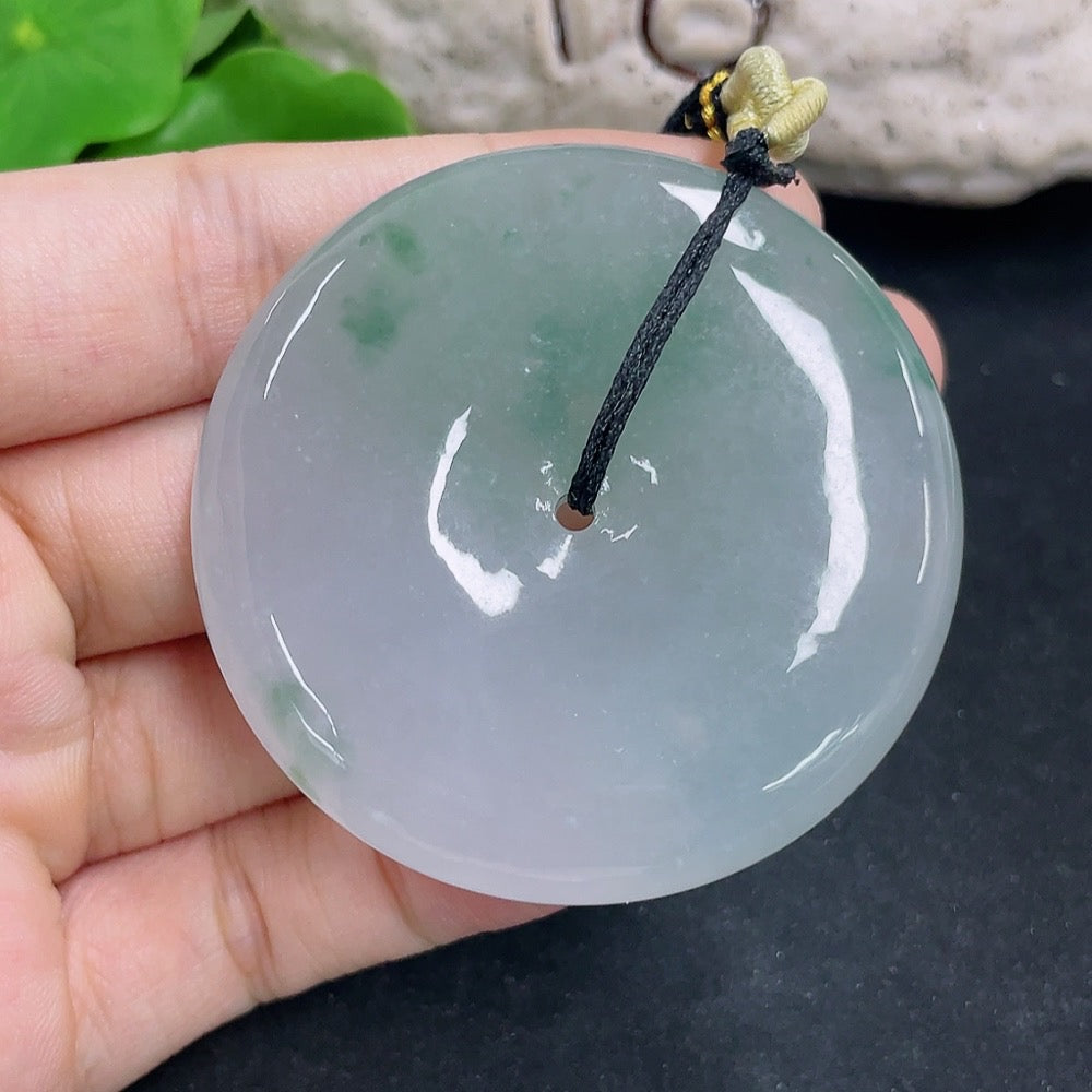 Jadeite Peace Knot pendant necklace in green jade with intricate knot design, weighing approximately 60.16g, by HKHQ.