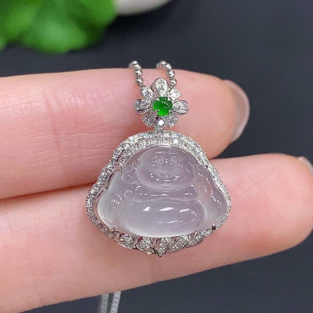 Jadeite Buddha pendant with 18k gold and diamond accents, displayed on a neutral background, showing intricate design details.