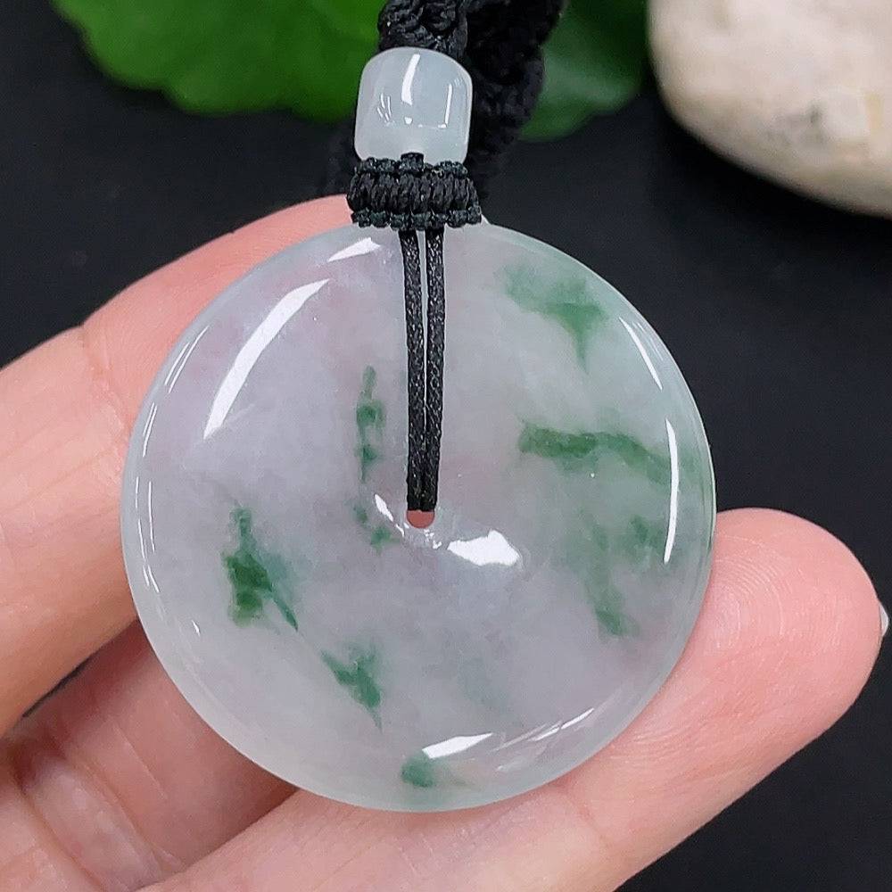 Jadeite Peace Knot pendant from HUILIU HQ, featuring a smooth green jade necklace with a carved peace knot design.