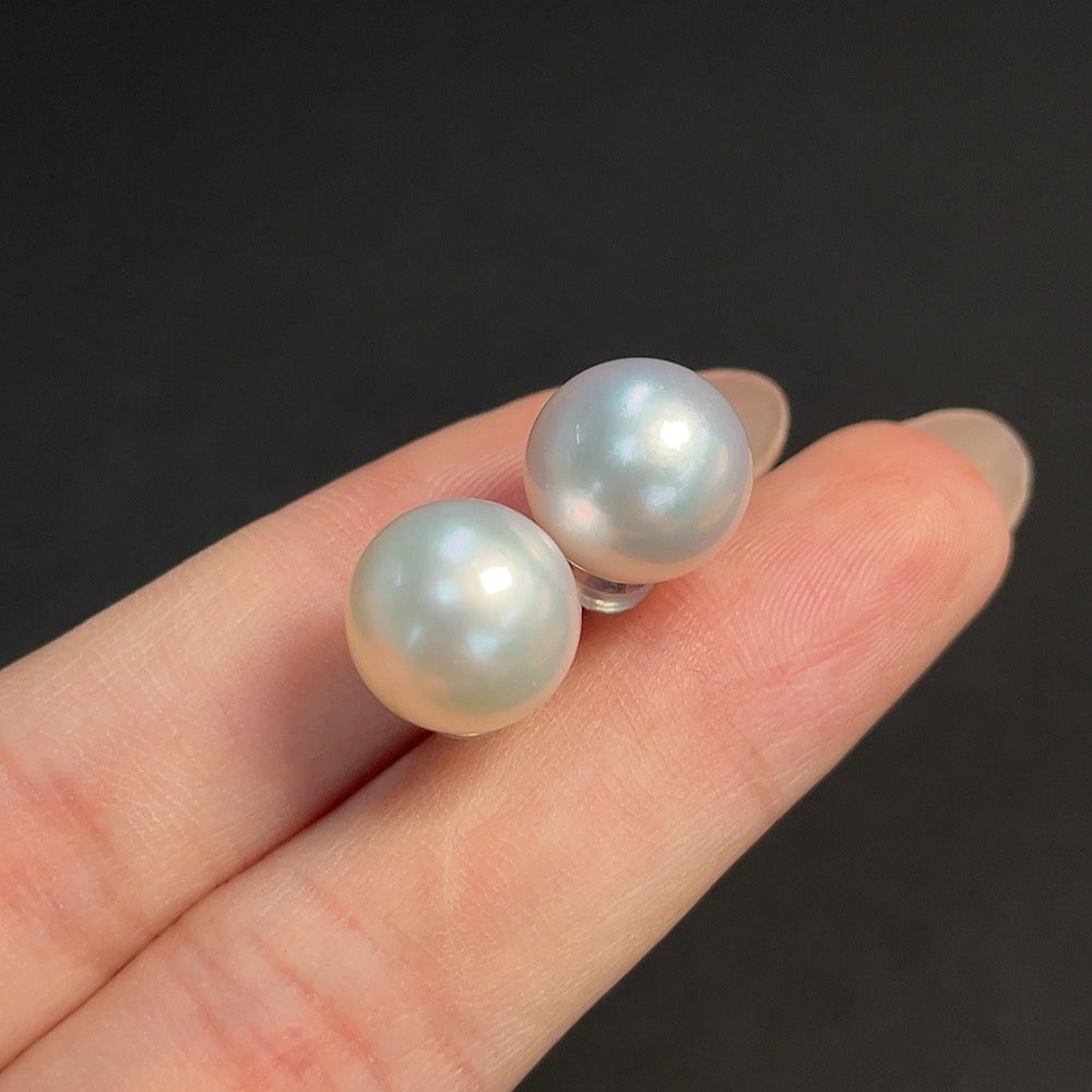 HKHQ seawater pearl earrings set in 18K gold with 11mm pearls, showcasing elegant pearl jewelry with a gold setting.