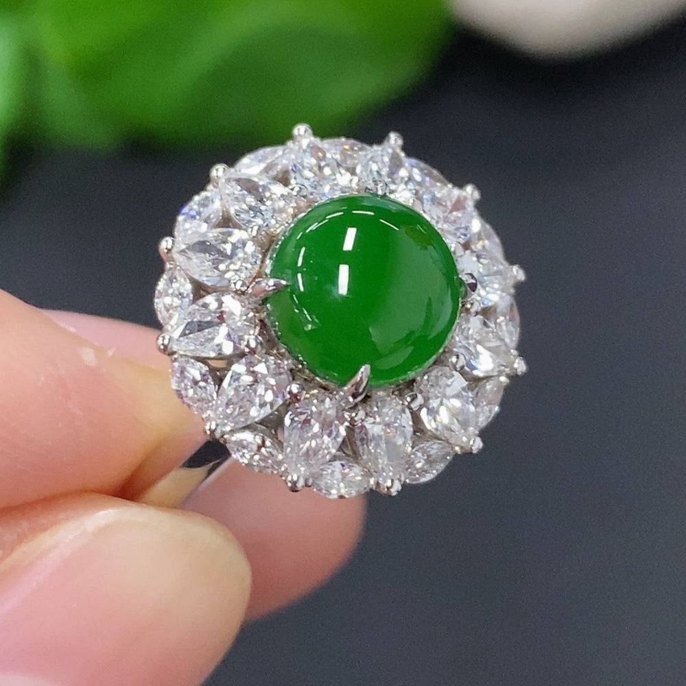 Jadeite cabochon inlaid ring with diamond accents in 18K gold, size 12, weighing approx. 5.2g, by HUILIU HQ.