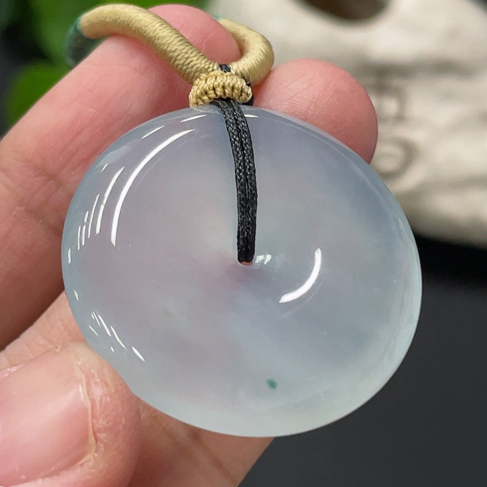 Jadeite pendant with peace buckle design, weighing approx. 14g with rope, crafted by HUILIU HQ, featuring smooth green jade surface