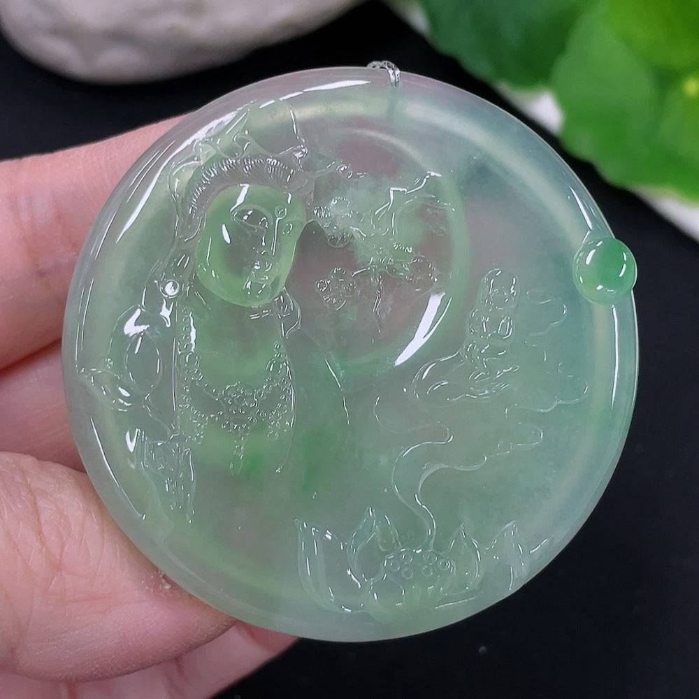 Huiliu HQ Jadeite Guanyin pendant featuring intricate carving and a smooth polished surface, showcasing traditional Chinese craftsmanship.