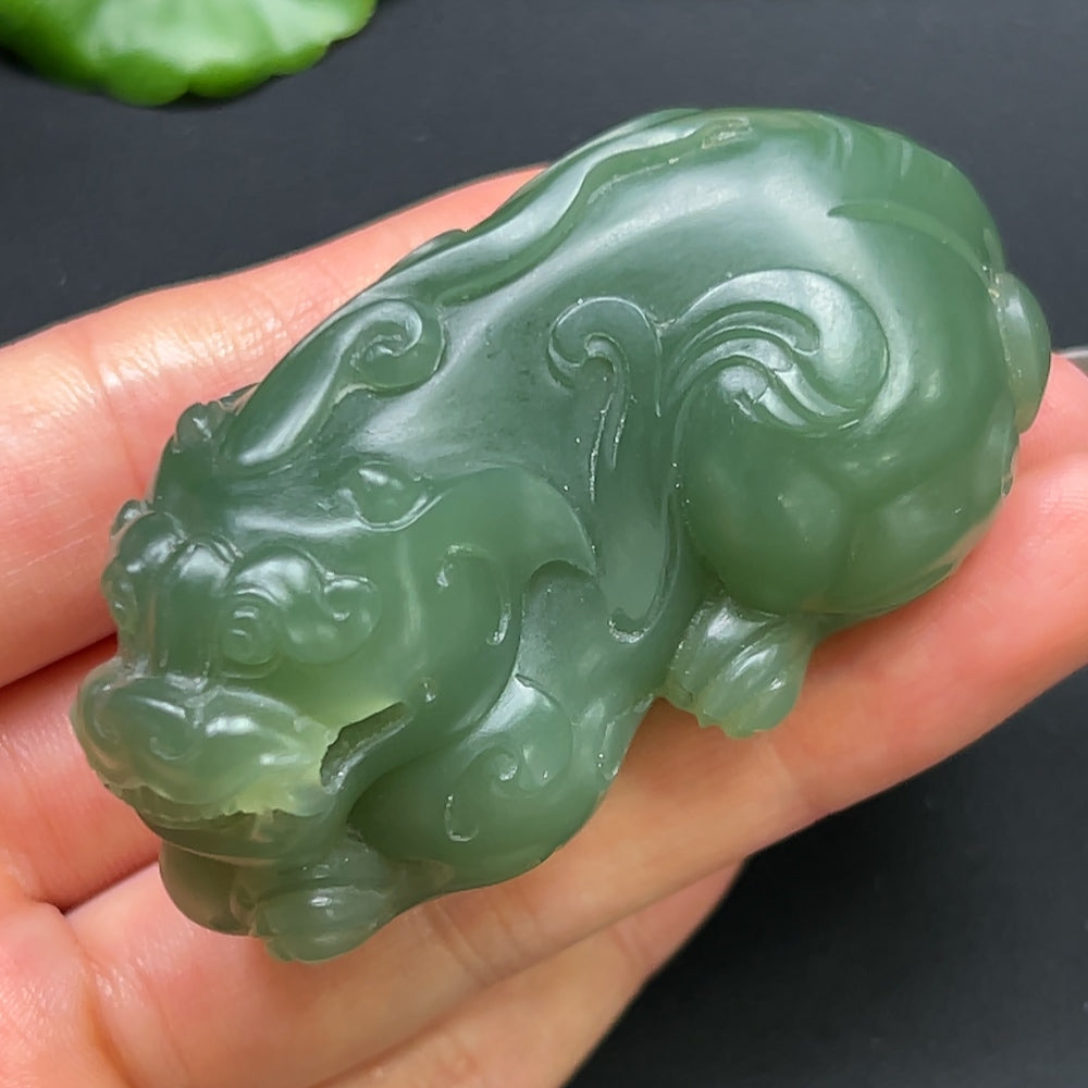Elegant Hetian Jade Pixiu pendant necklace from HKHQ featuring a detailed jade Pixiu charm on a sleek chain.