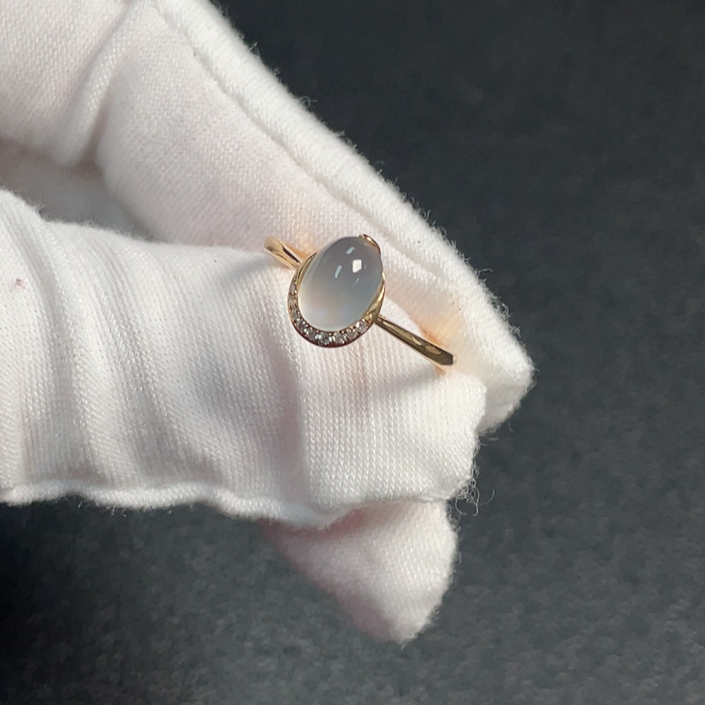 Huiliu certified gemstone moonstone ring with visible organic matter, showcasing natural organic inclusions and unique stone features.