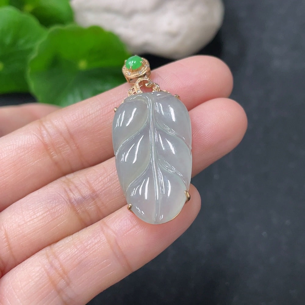 Huiliu Jadeite Leaf Pendant with diamond accents, featuring a detailed jade leaf design and sparkling diamond details.