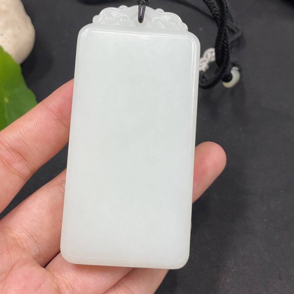 Huiliu certified Hetian jade pendant with plain design, showcasing smooth, polished jade surface and natural green tones.