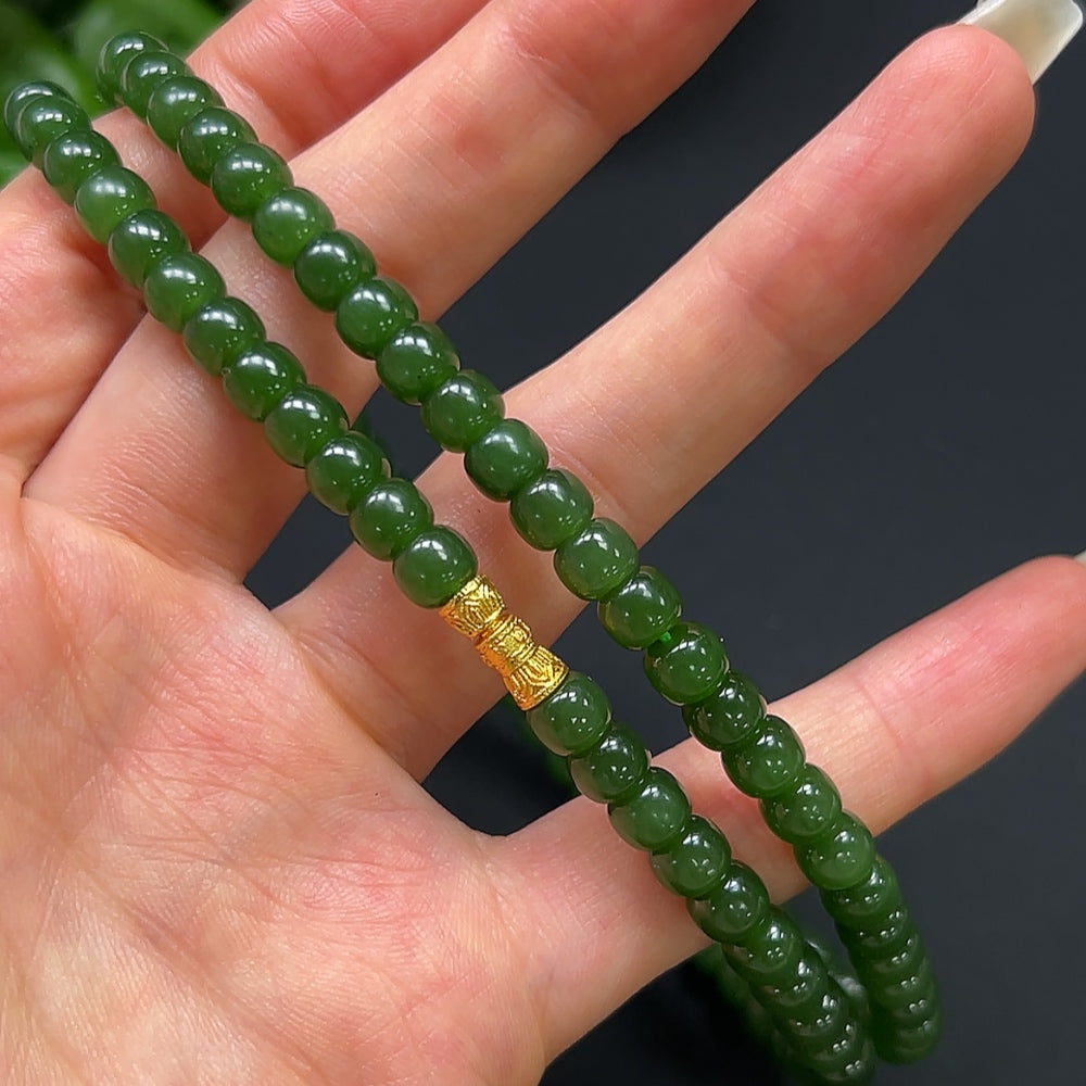 Hetian Jade bead necklace by HKHQ featuring 6.2mm smooth, non-gold jade beads on a classic string.