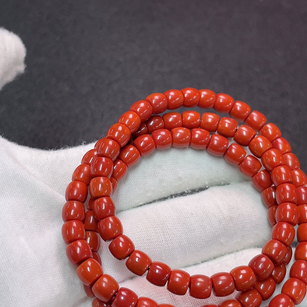 South Red Agate gemstone bead strand by HUILIU HQ, 5.6mm beads with visible organic matter, showcasing natural gemstone beauty.
