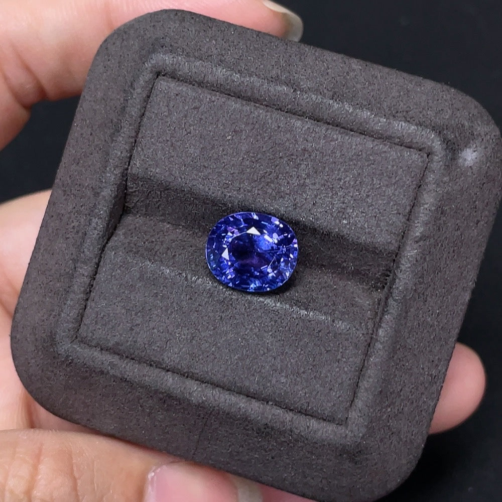 HKHQ 4.45 carat tanzanite loose gemstone, vibrant purple-blue jewelry stone with polished cut and raw gemstone appearance