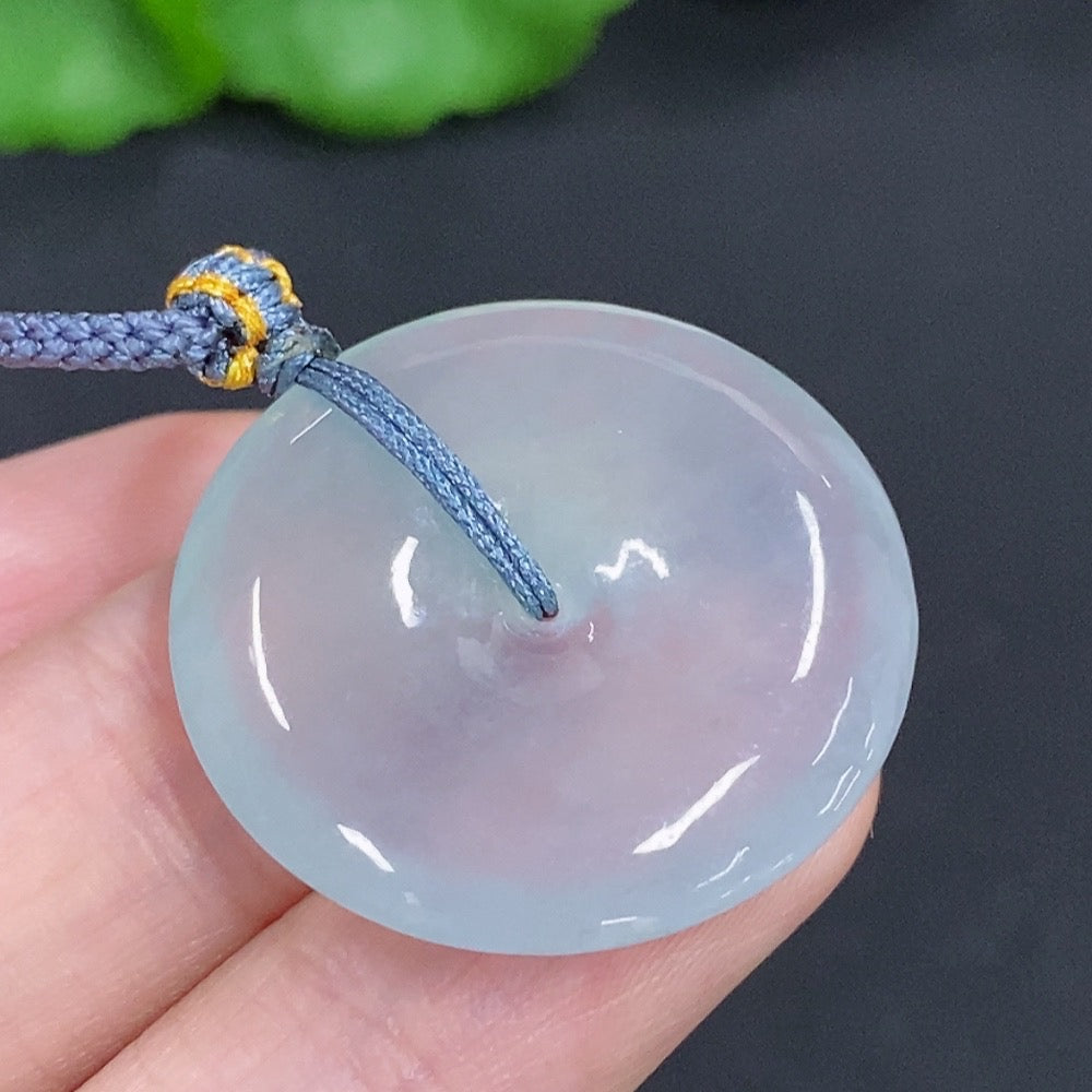 Jadeite safety pendant necklace by HKHQ featuring a polished green jadeite charm on a silver chain.