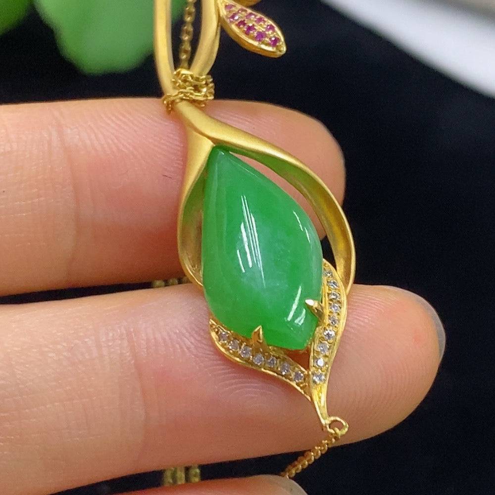 Jadeite inlaid necklace with 18k gold and diamonds, showcasing intricate craftsmanship and elegant design.