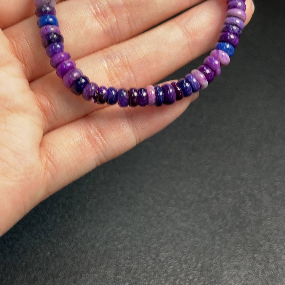 Huiliu certified Sugilite gemstone bracelet with purple 5.7mm beads, includes mineral components and organic matter, natural gemstone jewelry.