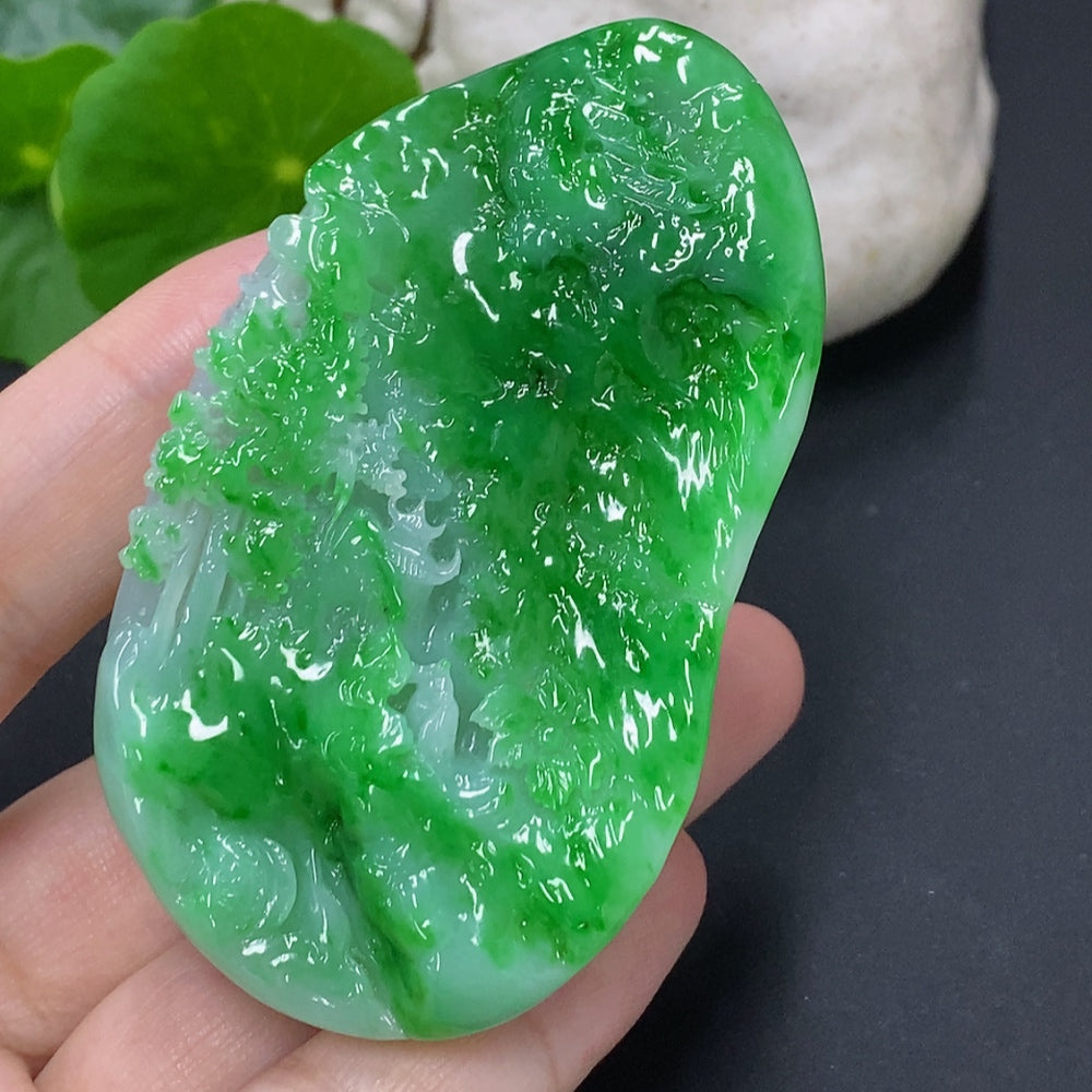 Jadeite landscape pendant by HKHQ featuring detailed natural jade with a weight of approximately 65.3 grams.