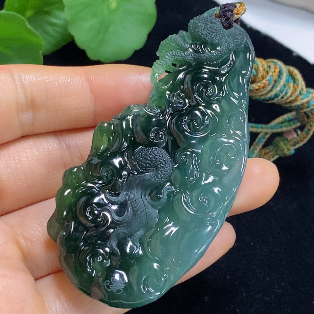 Jadeite pendant featuring a carved dragon plaque with a rope, weighing approximately 60g, crafted by HUILIU HQ.