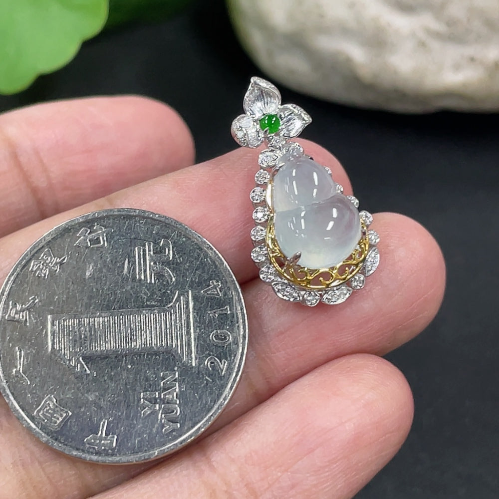 Jadeite gourd pendant with 18K gold and diamond accents, featuring a polished green jadeite stone on a necklace chain.