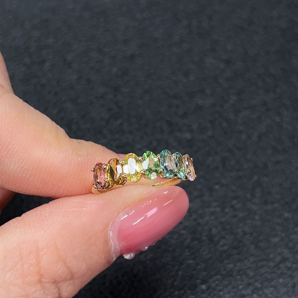 Huiliu certified gemstone tourmaline ring with no markings, showcasing a vibrant, polished gemstone set in a sleek band.