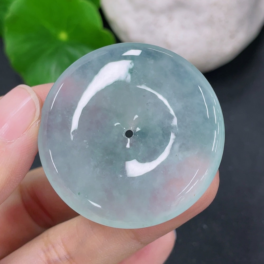 Jadeite pendant with peace buckle design, weighing approximately 16.72g, featuring vibrant green jade stone by HKHQ.