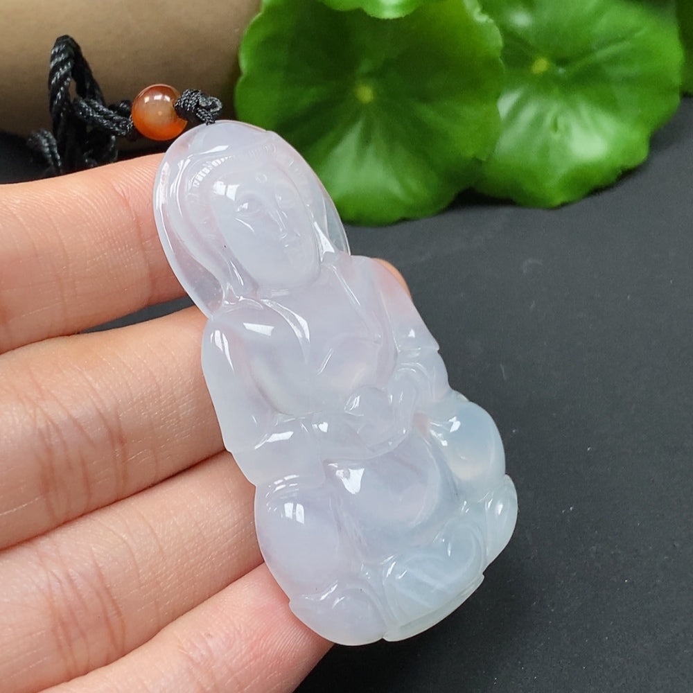 Jadeite Guanyin pendant necklace, HKHQ brand, featuring a detailed carved figure, weighing approximately 20.56 grams.