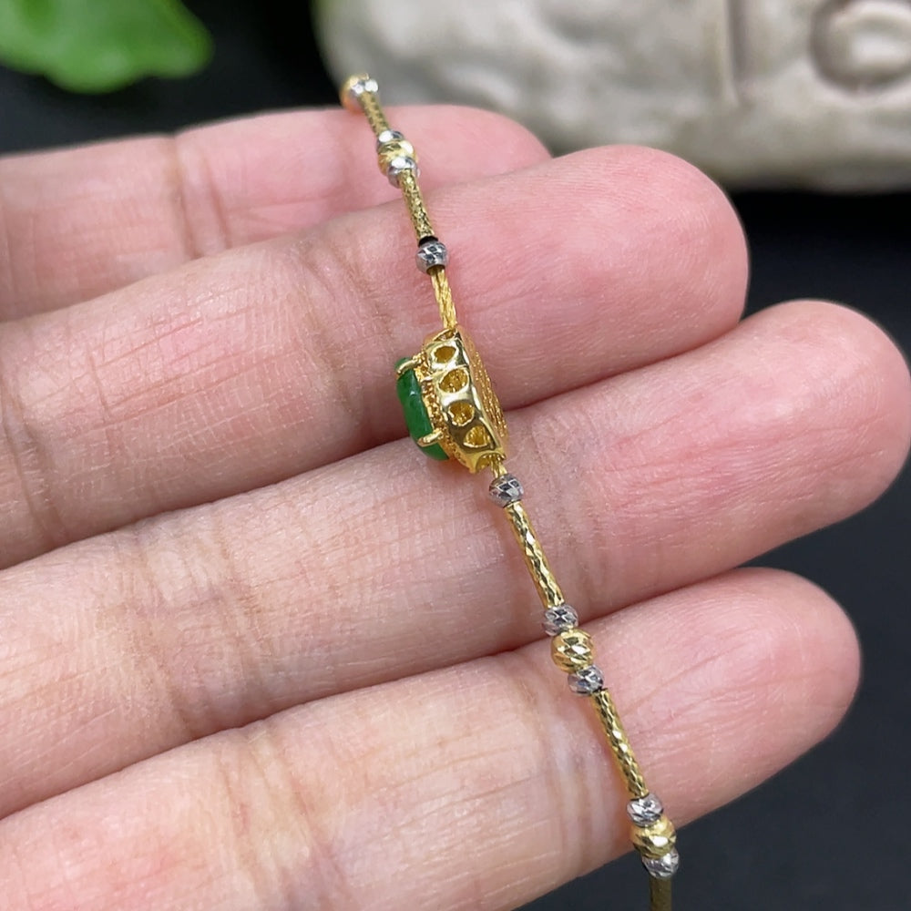 Jadeite gourd bracelet by HKHQ with 18k gold inlay and diamond accents, featuring a delicate, elegant design.