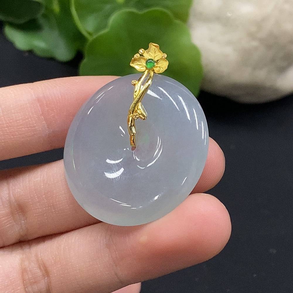 HUILIU HQ jadeite Peace Knot pendant with diamond accents, showcasing intricate craftsmanship and polished green jade jewelry.
