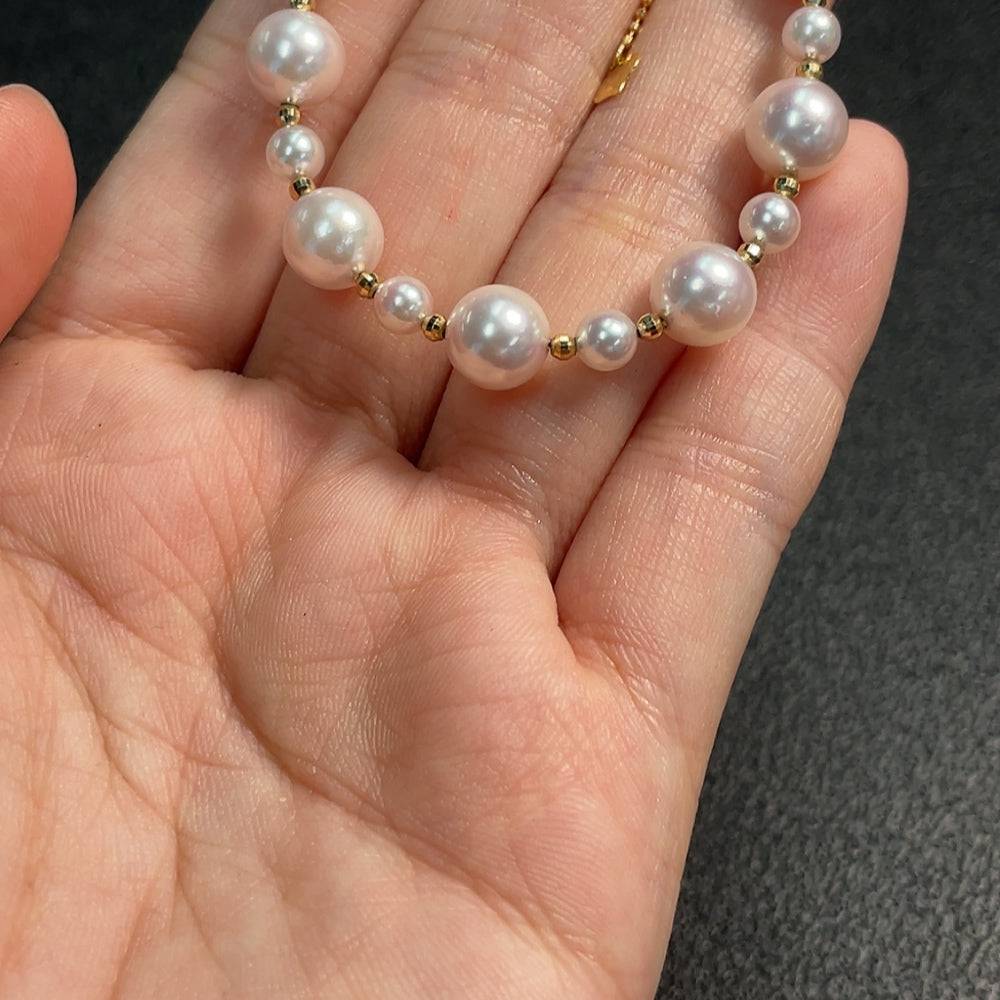 Seawater pearl bracelet by HUILIU HQ with red beads, 18k gold clasp, 4.3-7.2mm pearls, total weight 7.24g, string not detected