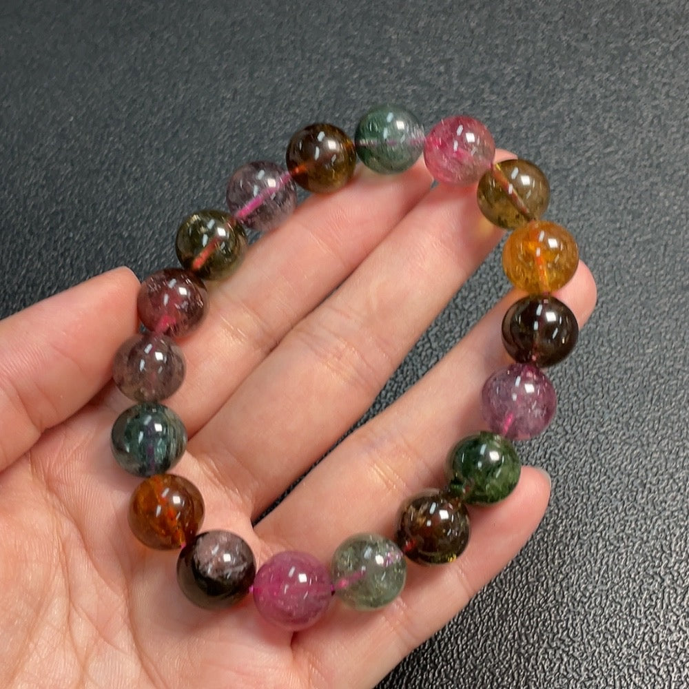 Huiliu gemstone tourmaline bracelet with visible organic matter, 11.7mm size, featuring natural gemstone beads in a stylish design.