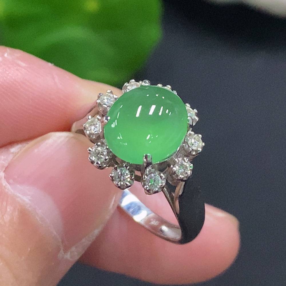 Jadeite cabochon solitaire ring with diamond accents in 18K gold, size 14, featuring a polished green jade stone and gold band