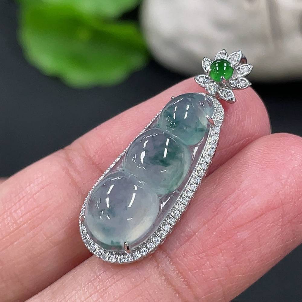 Jadeite lucky bean pendant with 18K gold accents and diamond details, featuring a smooth green jade pendant on a delicate chain.