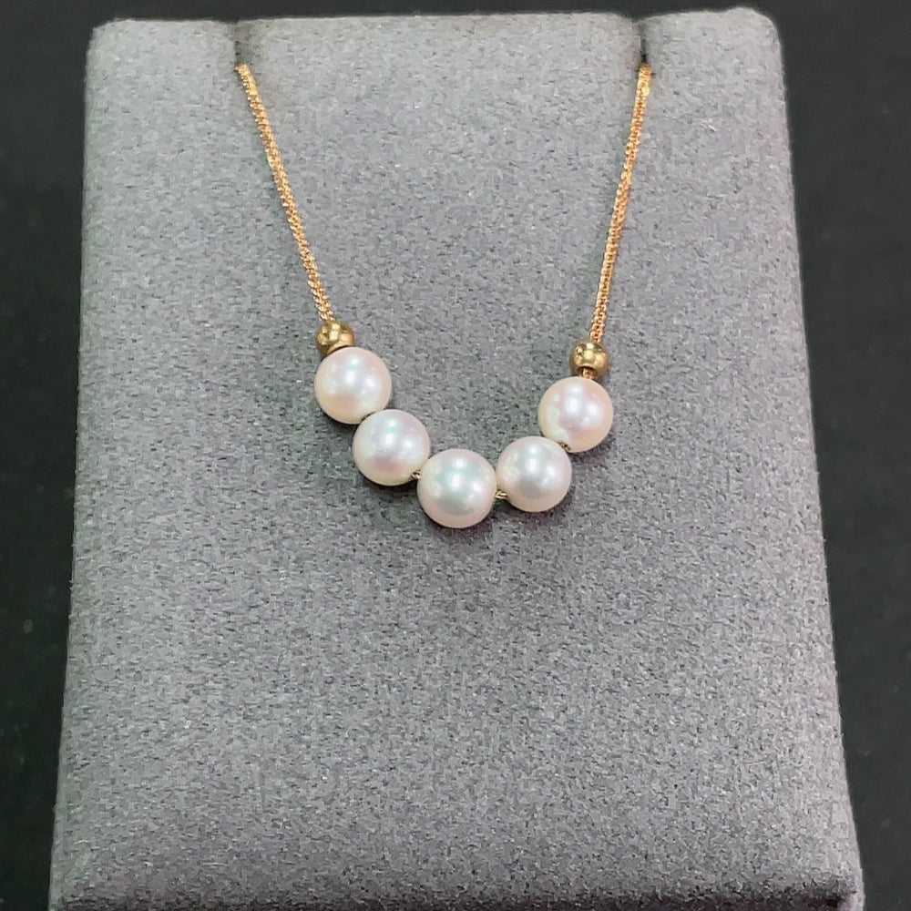 Seawater pearl necklace with 18k gold clasp, 5.6mm pearls, total weight 2.32g, from HKHQ, elegant jewelry accessory