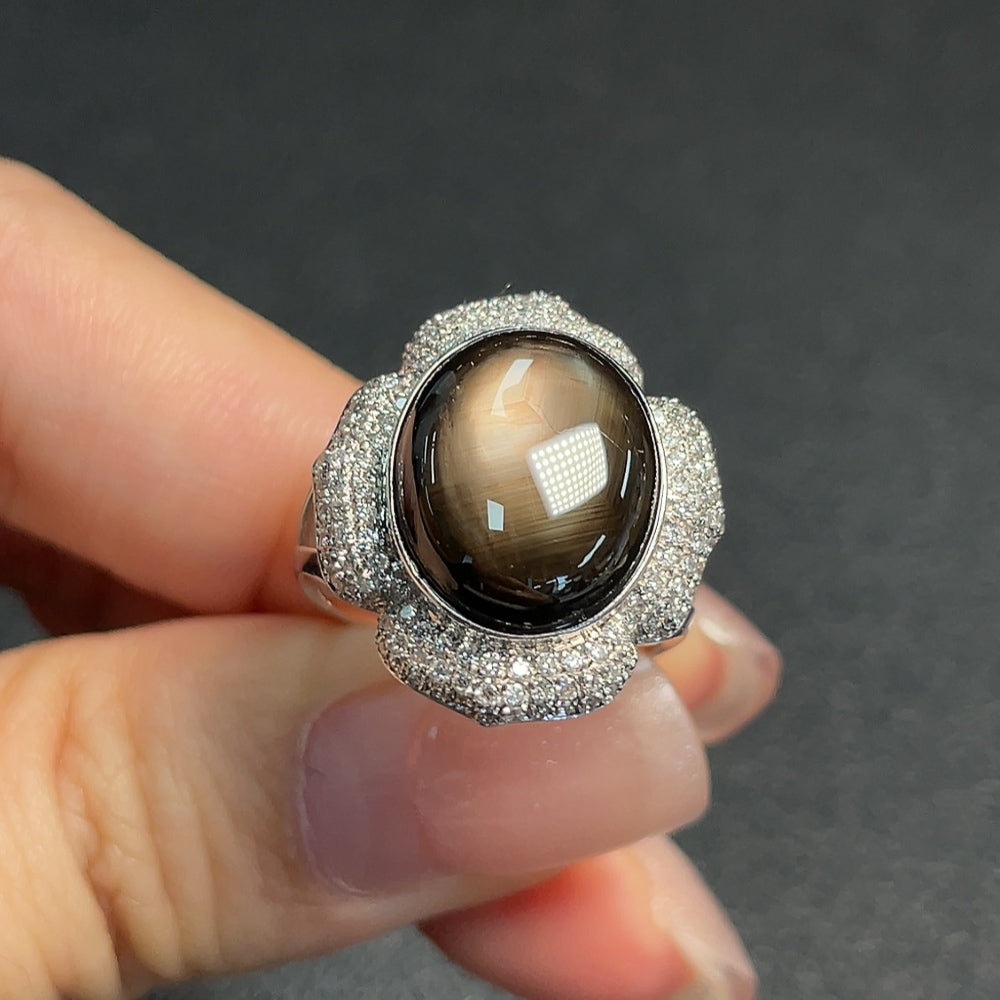 Huiliu certified sapphire ring with sparkling diamond accents, showcasing a vibrant blue gemstone and elegant silver band.