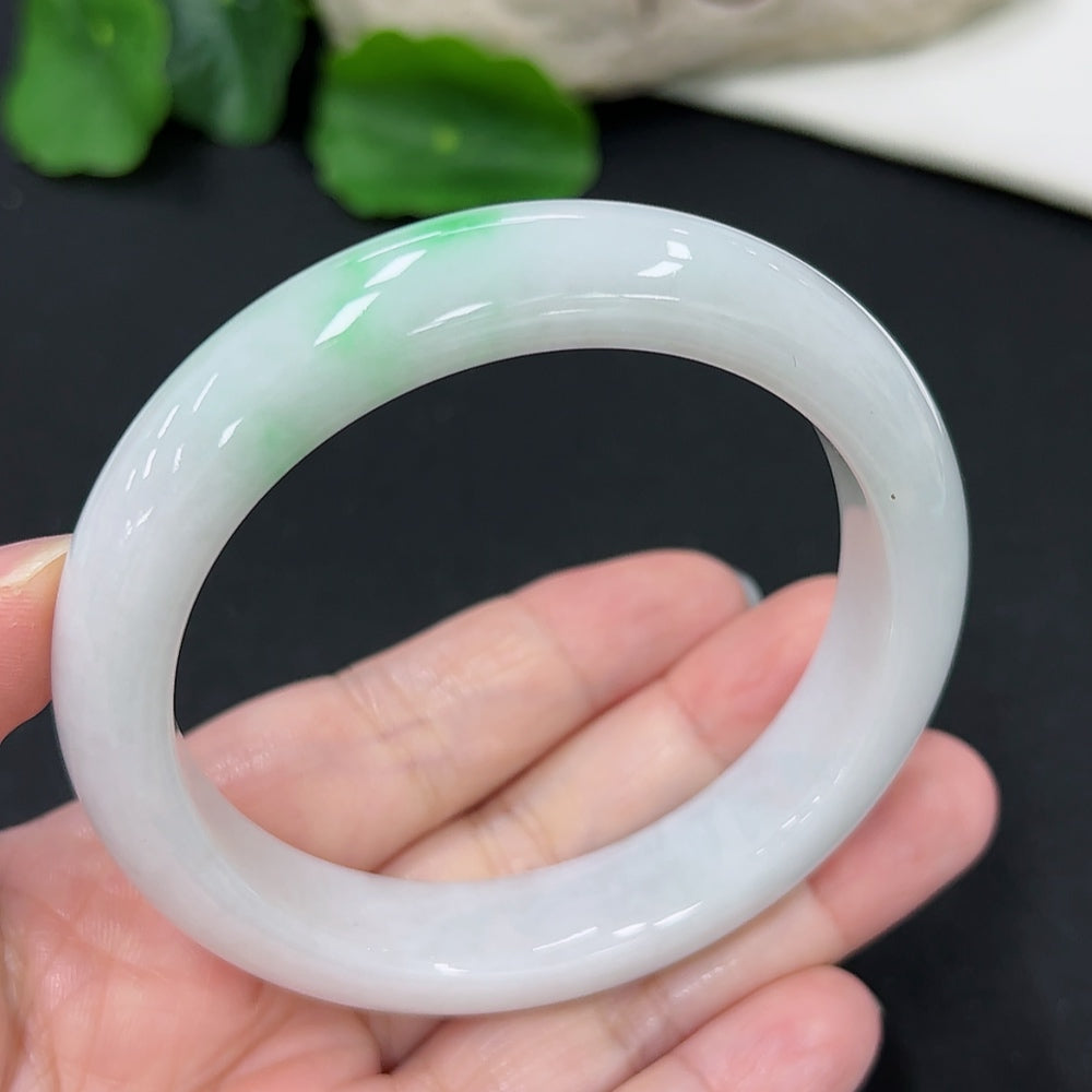 HKHQ jadeite round bangle, size 57.4, 60.67g, showcasing smooth, polished jadeite bracelet with a rounded design.