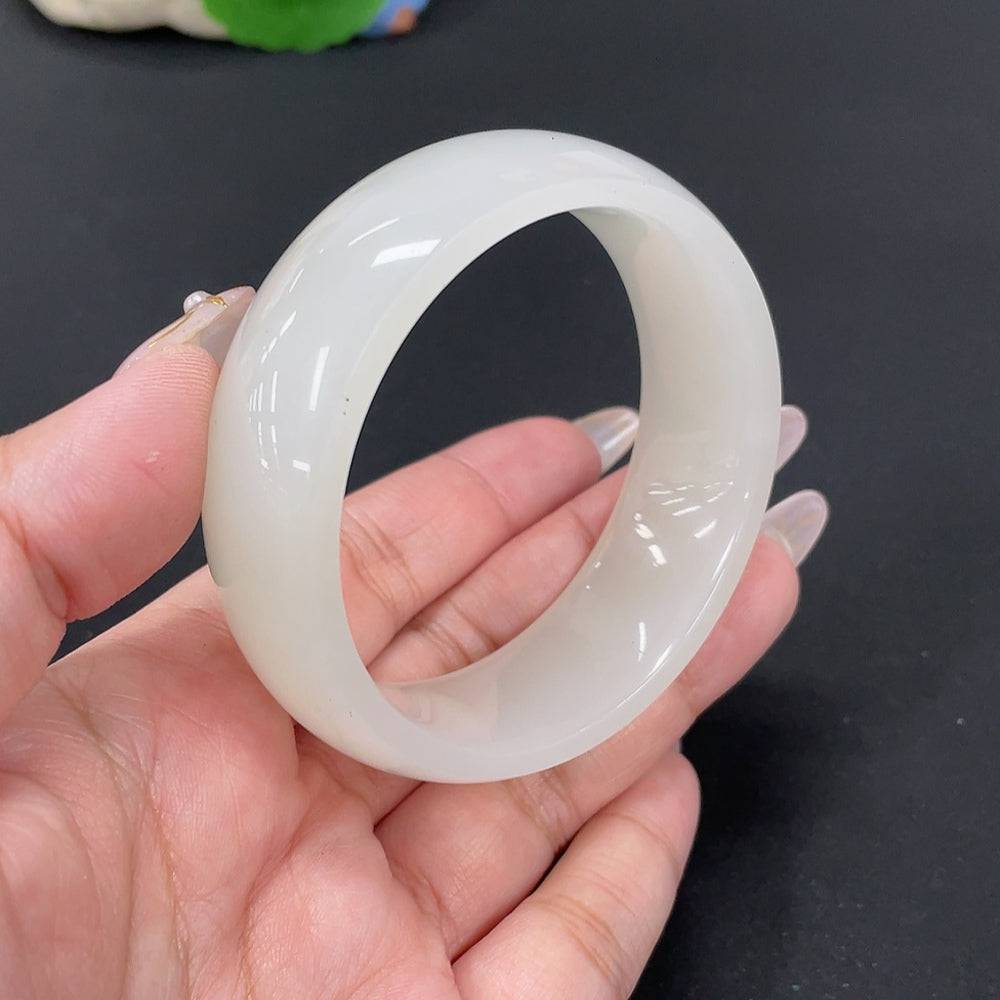 Hetian jade round bracelet by HUILIU HQ showing smooth, polished jade beads with a silver clasp, size 57.2, total weight 74.4g.