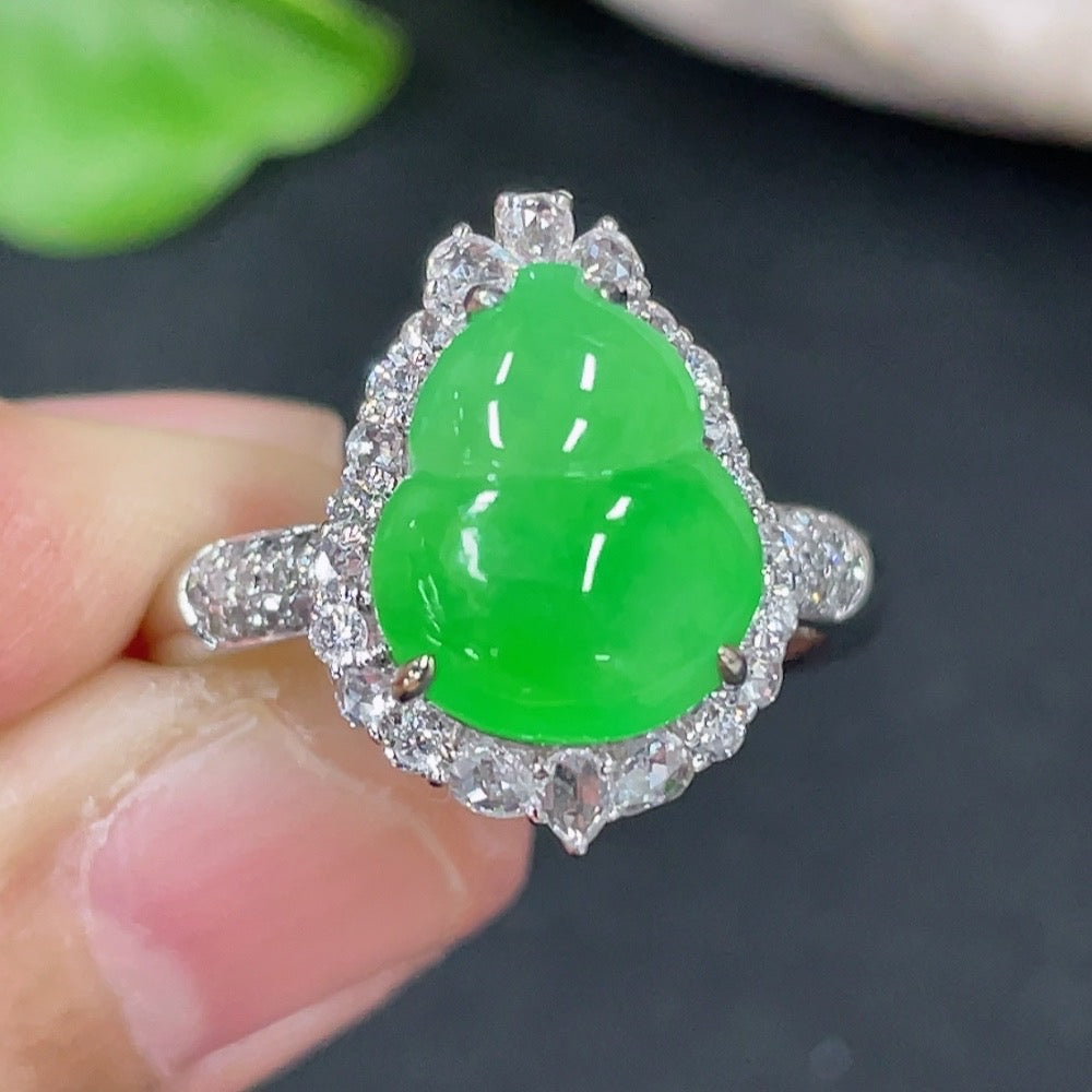 Jadeite gourd inlaid ring with 18K gold setting and diamond accents, crafted by HKHQ, displaying intricate jewelry details.