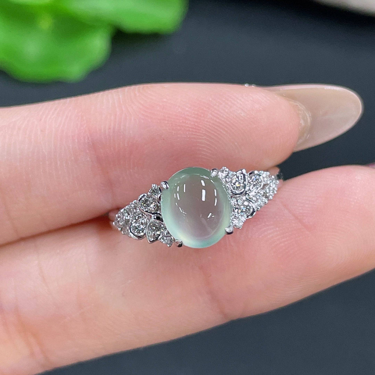 Jadeite ring with 18k gold setting and diamond accent, size 14, crafted by HUILIU HQ, weight approximately 2.86g.