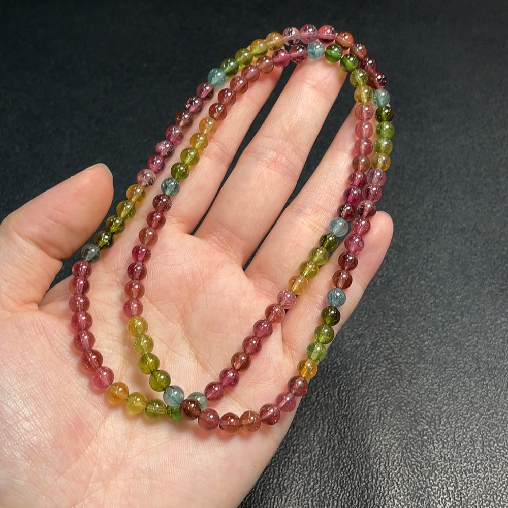 Tourmaline bead necklace with organic matter and mineral components, 5.3mm beads, from HUILIU HQ gemstone jewelry.