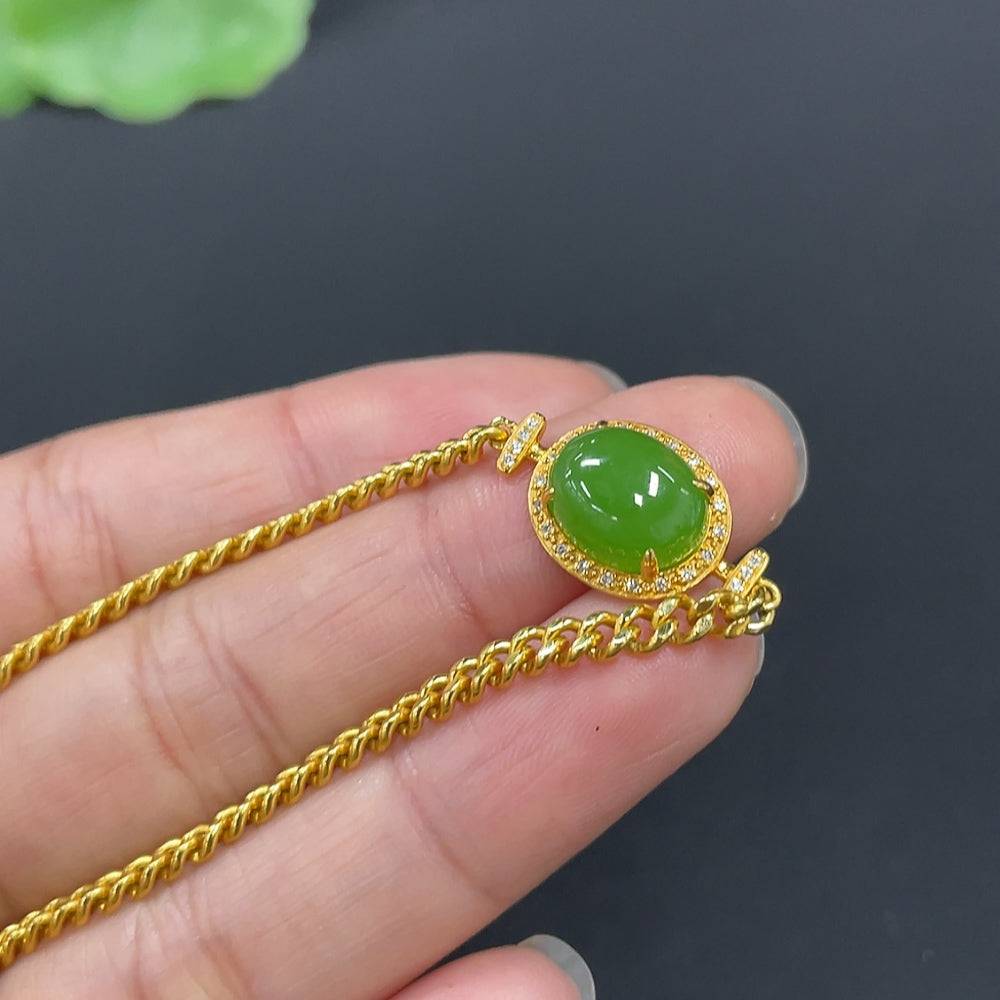Hetian jade jasper cabochon bracelet with 18K gold and diamond accents, featuring natural jade stones and intricate inlay design.