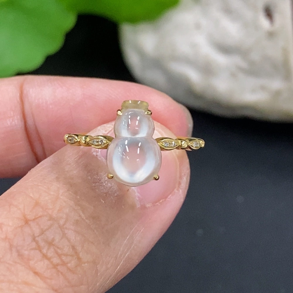 Jadeite gourd ring with 18K gold band, non-diamond jewelry, crafted by HKHQ, showcasing intricate design and vibrant green jadeite.