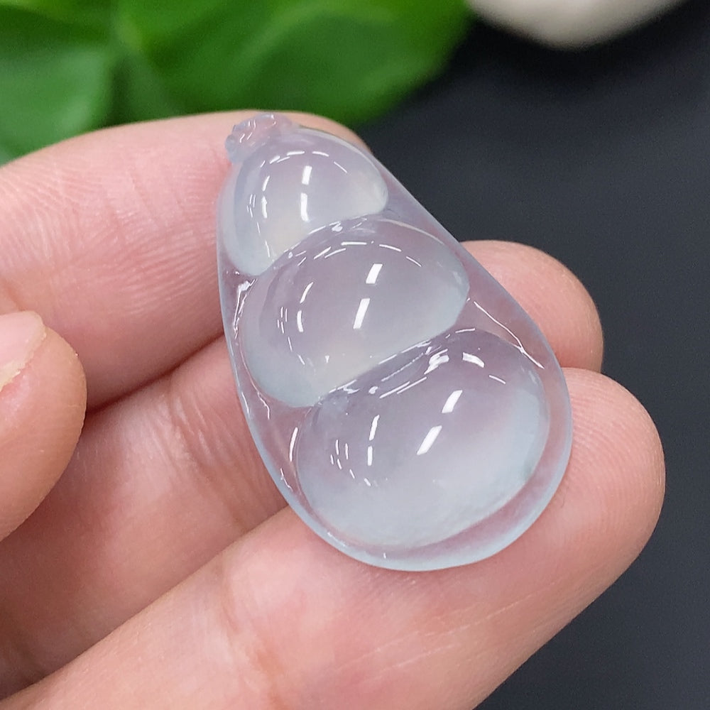 Huiliu Jadeite blessed bean inlay piece, a finely crafted jade accessory with intricate inlay details and a smooth polished surface.